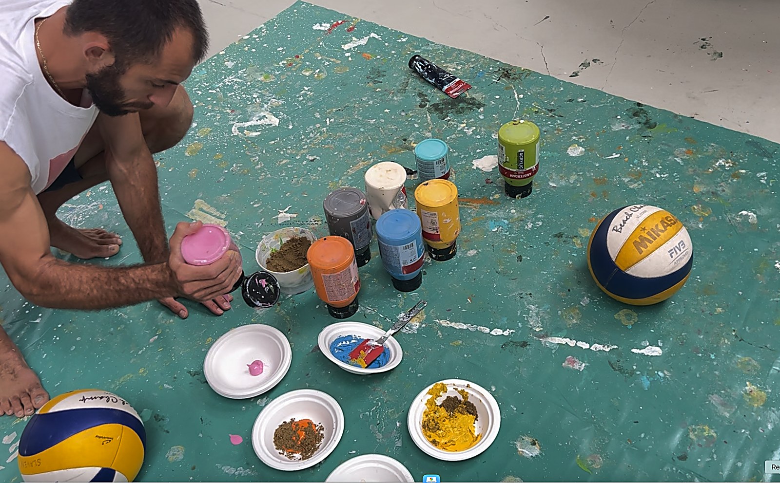 Slaven painting with sports equipment